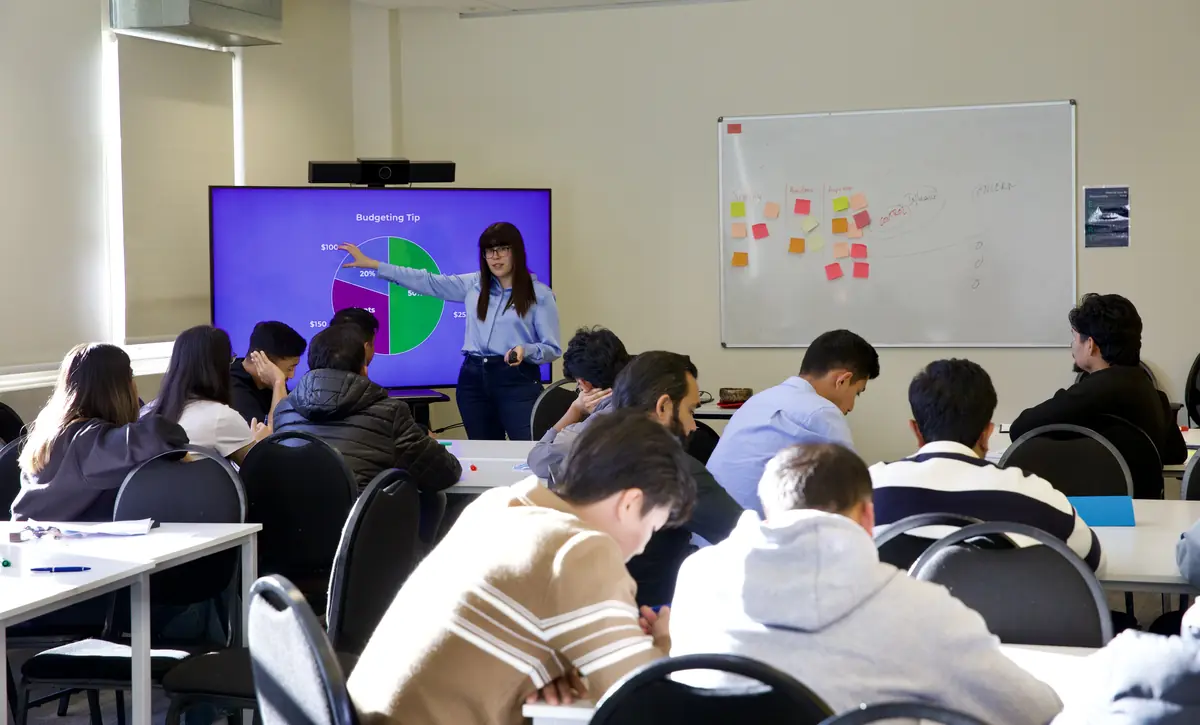 A facilitator presenting a financial wellbeing session