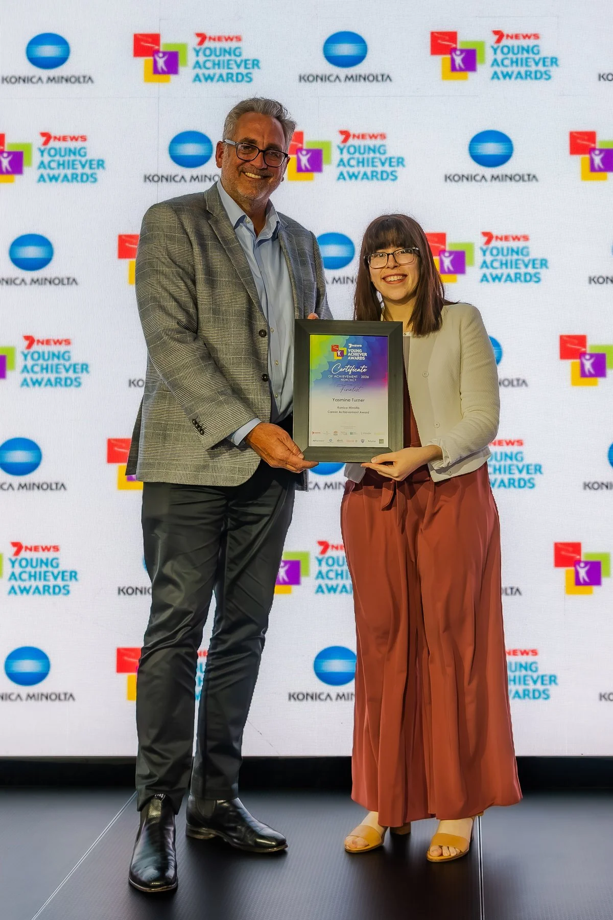 Yasmine receiving her finalist certificate at the 7NEWS Young Achiever Awards